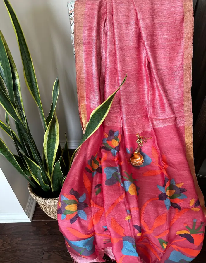 Pink Tussar Jamdani Saree with Multicolor Bold Floral Weave and Golden Border Pink Tussar Jamdani Saree with Multicolor Bold Floral Weave and Golden Border