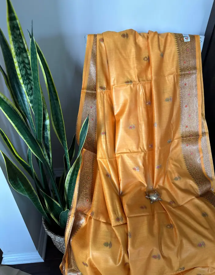 Golden Mustard Baluchari Saree with Zari Border and Floral Buti Work Golden Mustard Baluchari Saree with Zari Border and Floral Buti Work